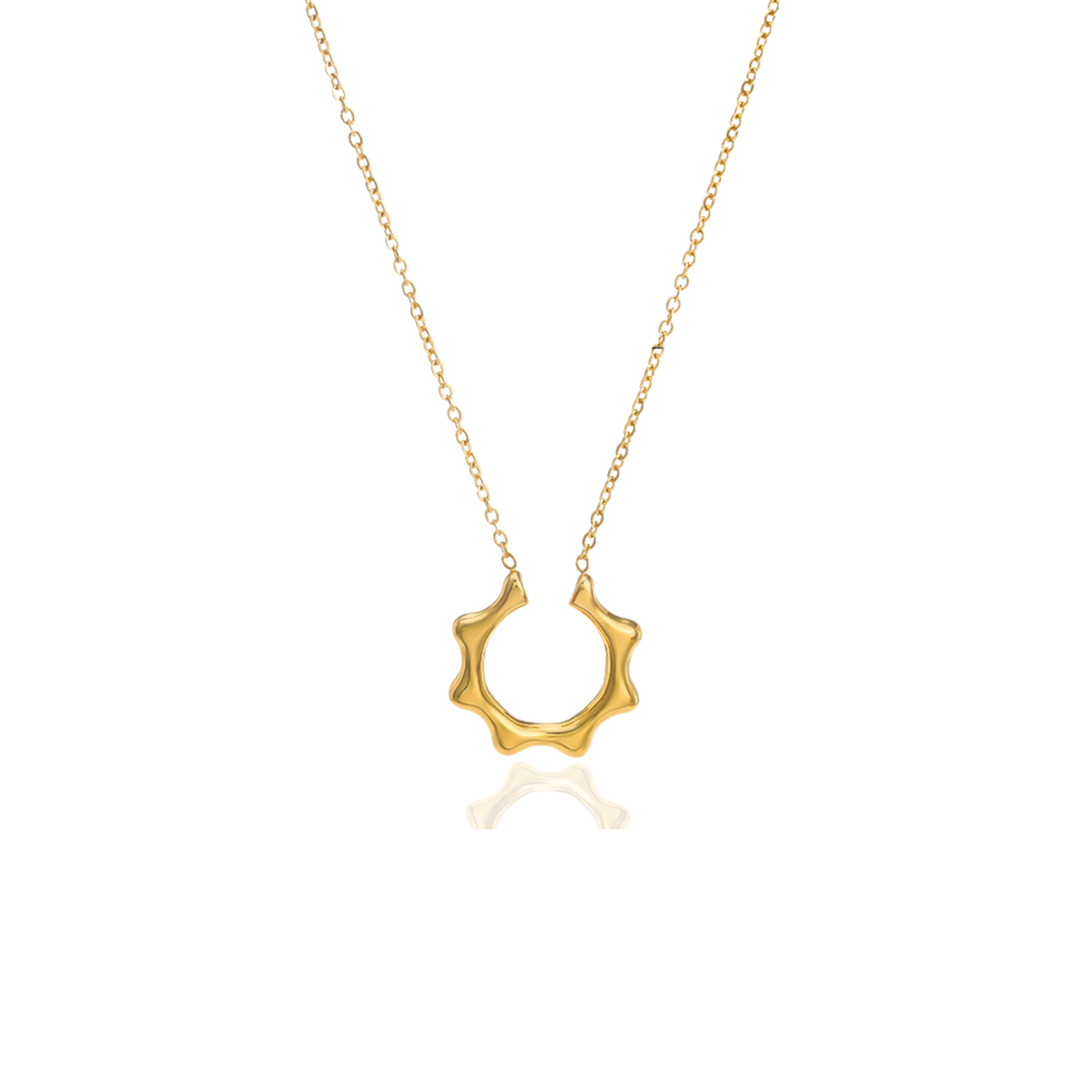A gold necklace featuring a textured, wavy circular pendant on a delicate gold chain, presented against a clean white background with a soft reflection below.