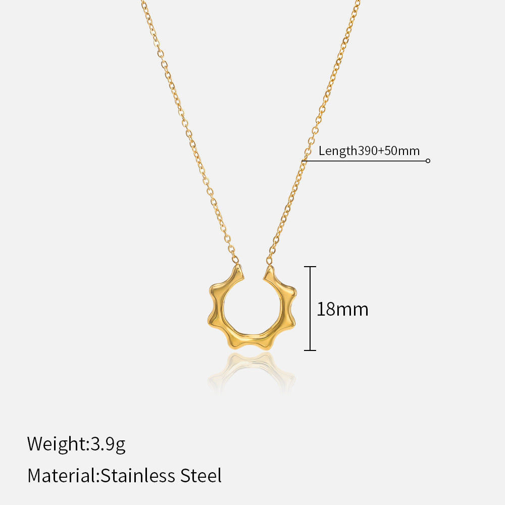 Gold necklace with measurements on a white background