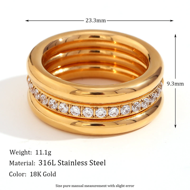 A gold-toned multi-band ring with a row of clear stones across the front, shown on a white background with measurement arrows and text indicating dimensions, weight, material, and color.