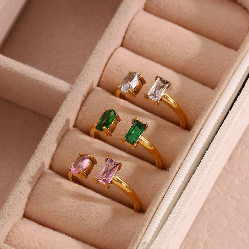 Gold rings with gemstones in a jewelry box
