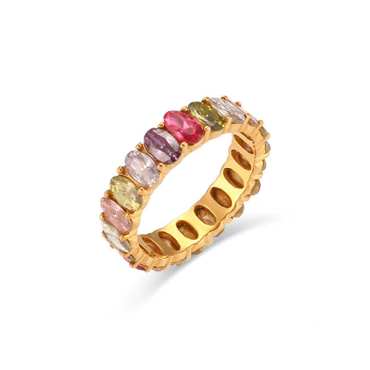 Gold ring with multicolored gemstones on a white background