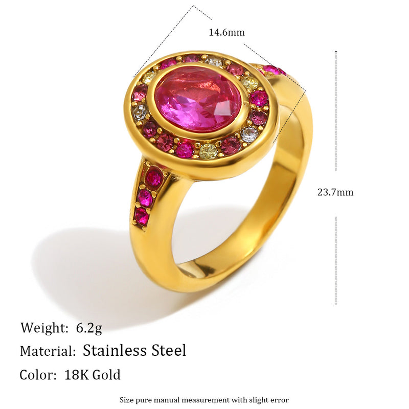 Gold ring with a pink gemstone and measurements on a white background