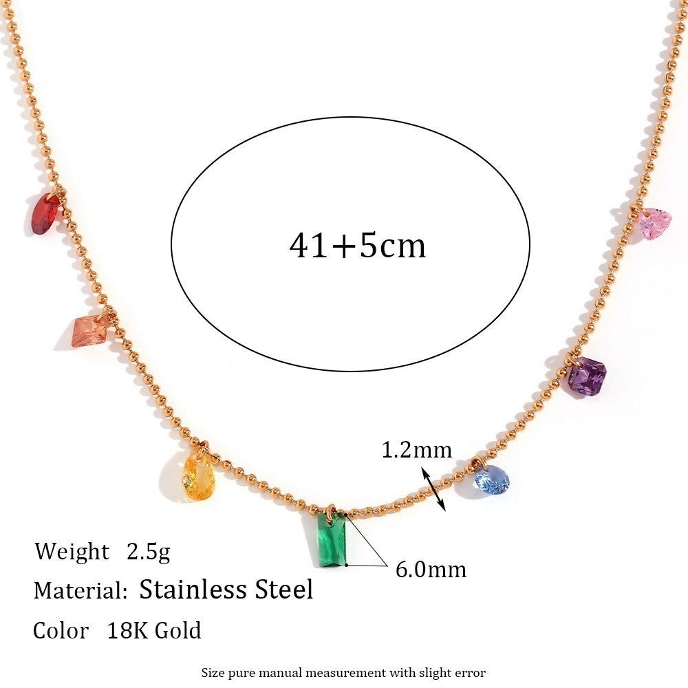 Gold-toned stainless steel beaded necklace with colorful gemstone charms, shown with measurement annotations including 41+5cm length, 1.2mm bead width, 6.