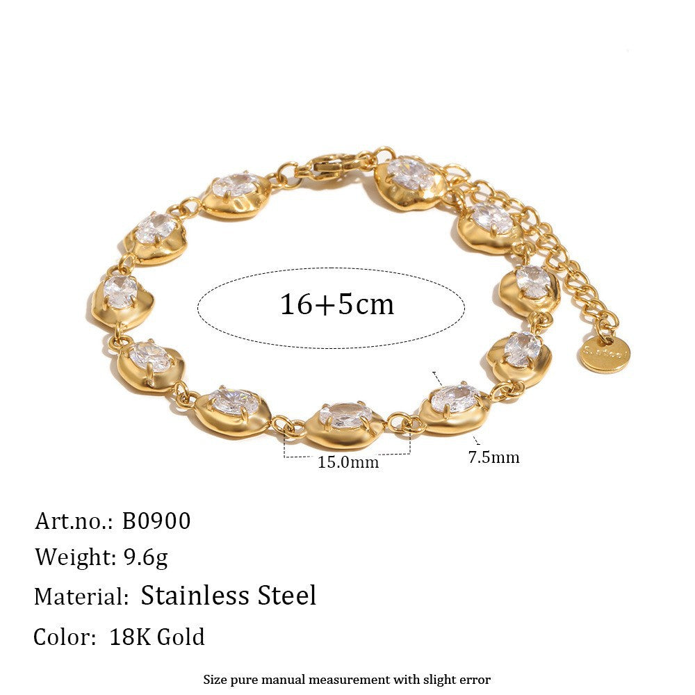 Gold bracelet with measurement details on a white background
