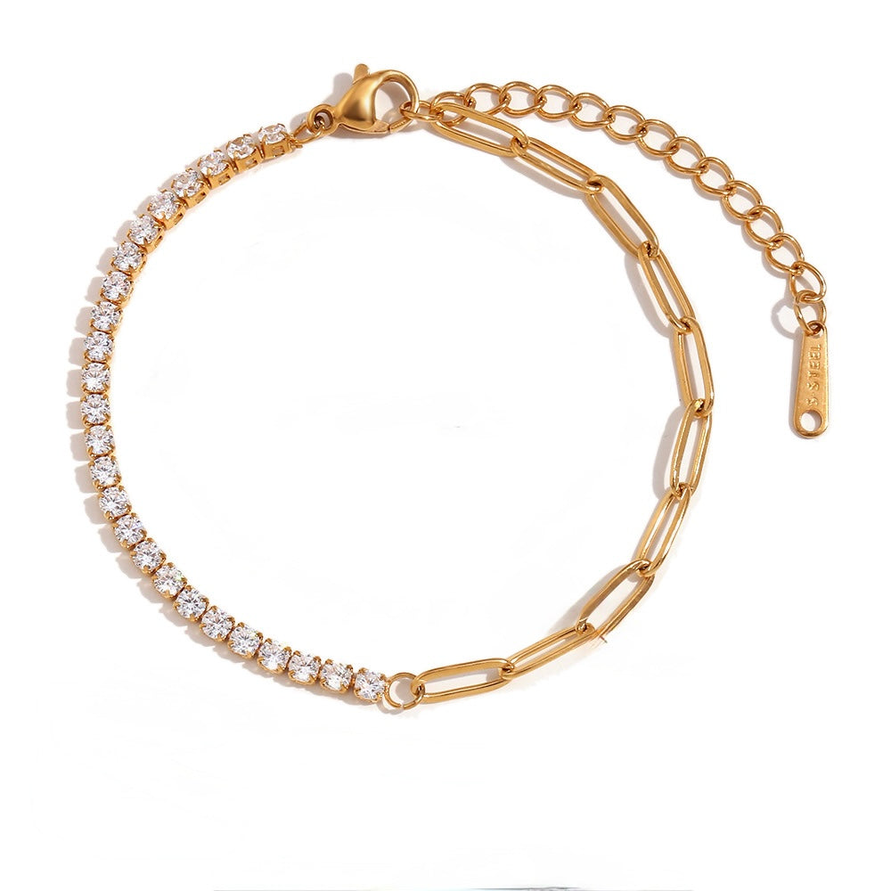 A gold chain bracelet featuring one half set with small clear round stones and the other half with larger elongated gold links, displayed on a clean white background.