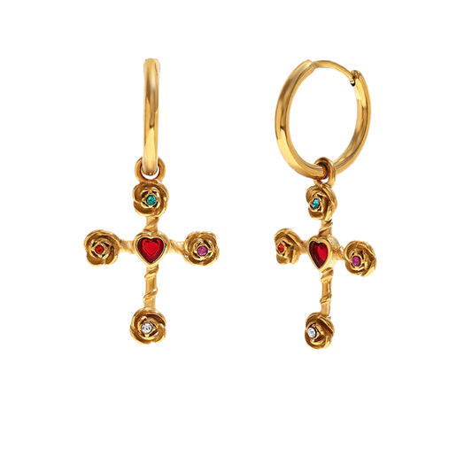 A pair of gold hoop earrings with dangling cross charms, featuring a central red heart and small multicolored gemstone accents, shown on a plain white background.